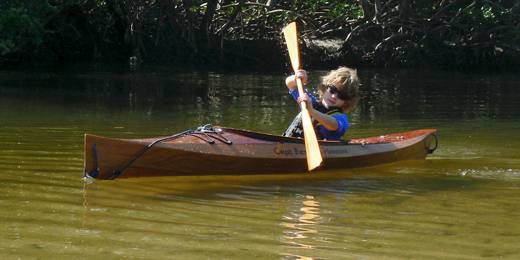 The Wood Duckling is a stylish wooden kayak for children