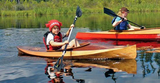 The Wood Duckling is a stylish wooden kayak for children