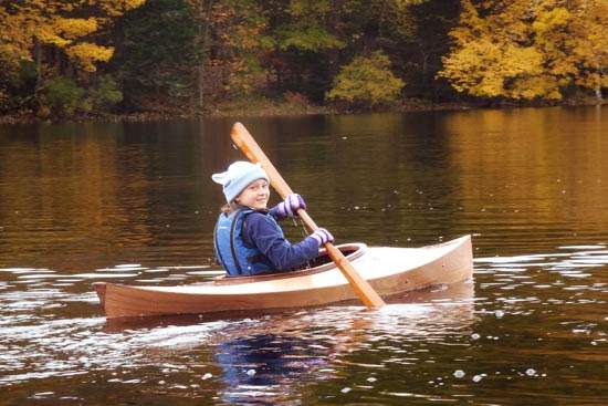 The Wood Duckling is a stylish wooden kayak for children