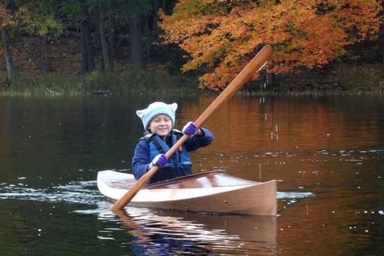 The Wood Duckling is a stylish wooden kayak for children