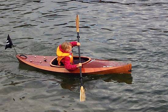 The Wood Duckling is a stylish wooden kayak for children