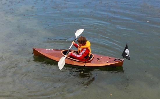 The Wood Duckling is a stylish wooden kayak for children