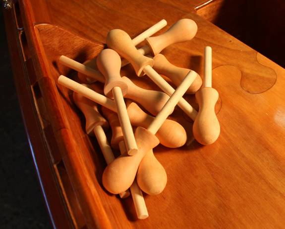 Traditional wooden belaying pins for sailing boats