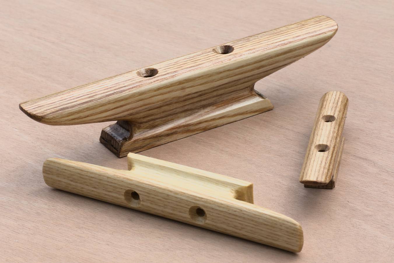 Handmade wooden horn cleats to add a traditional finishing touch to any wooden boat